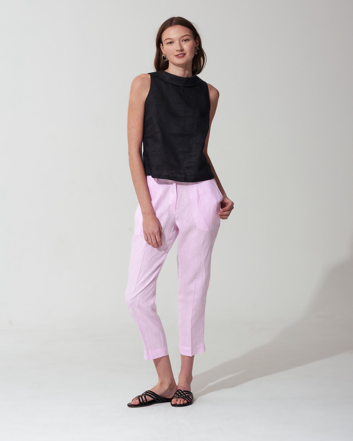 Woman wearing Pastel Pink Capri Trousers