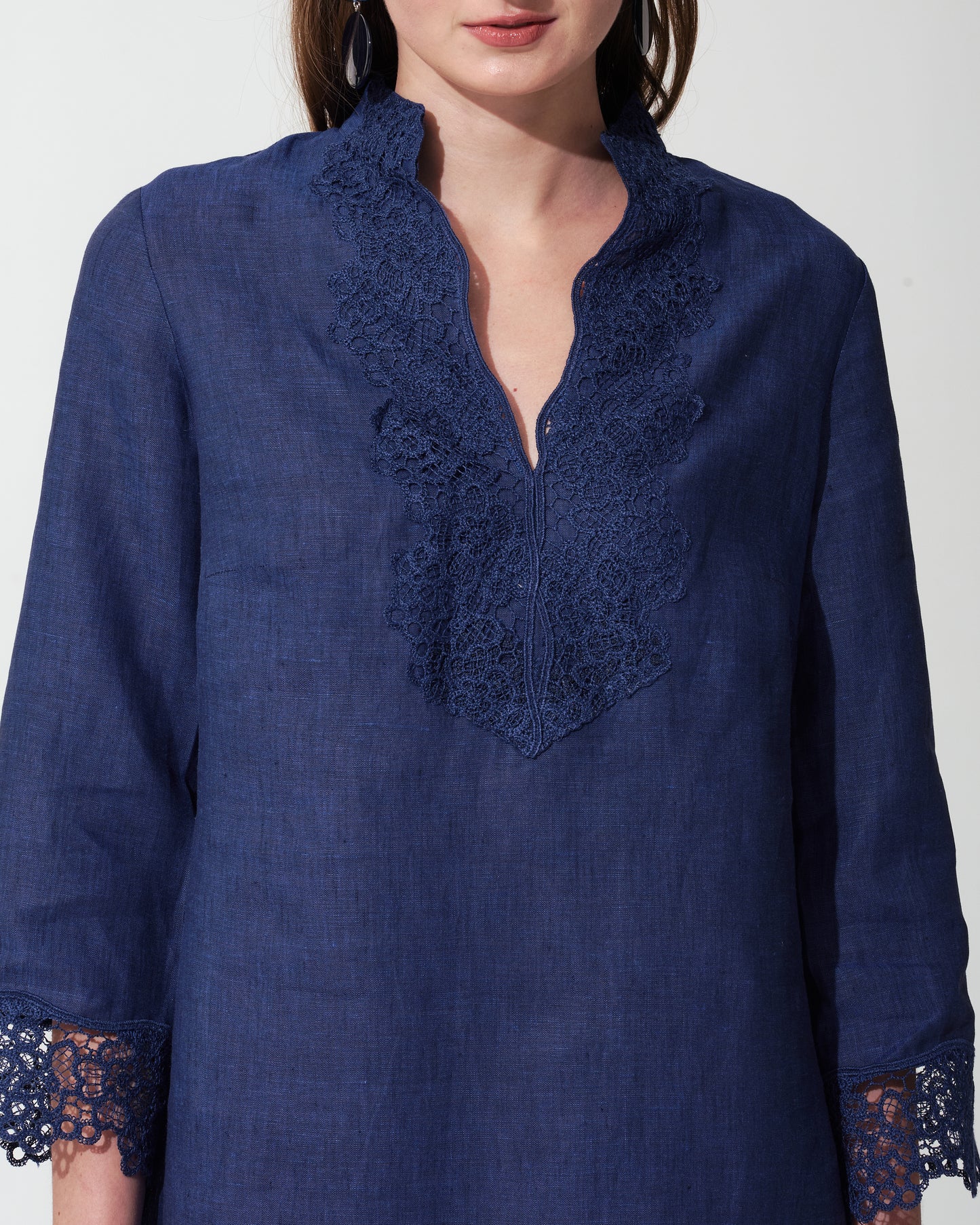 Navy blue royal shirt with lace detailing on a  background